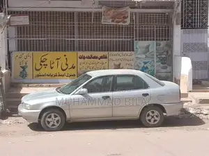 Photo - Suzuki Baleno 2000 Sedan - Used Vehicle with Potential