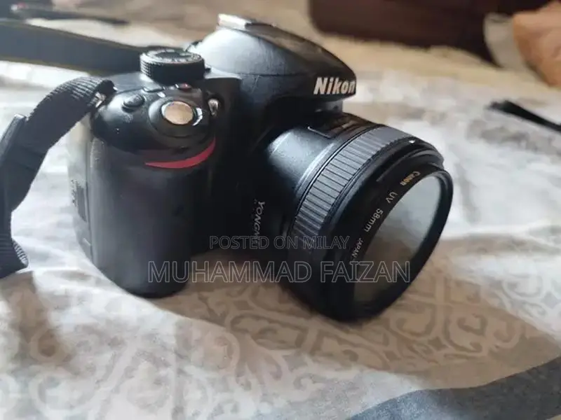 Nikon D3200 DSLR Camera with 35mm Lens and Accessories