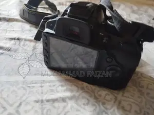 Nikon D3200 DSLR Camera with 35mm Lens and Accessories