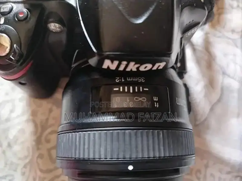 Nikon D3200 DSLR Camera with 35mm Lens and Accessories