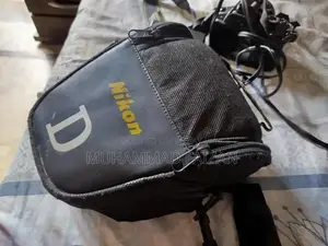 Nikon D3200 DSLR Camera with 35mm Lens and Accessories