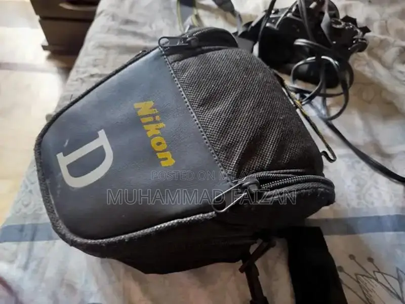 Nikon D3200 DSLR Camera with 35mm Lens and Accessories