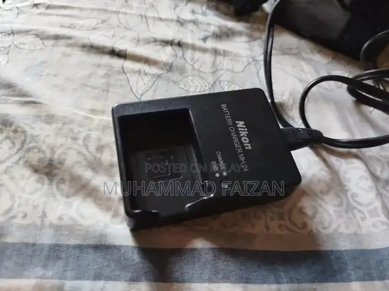 Nikon D3200 DSLR Camera with 35mm Lens and Accessories