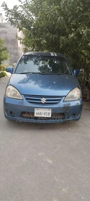 Photo - Suzuki Liana Silver Sedan with Air Conditioning and Music System
