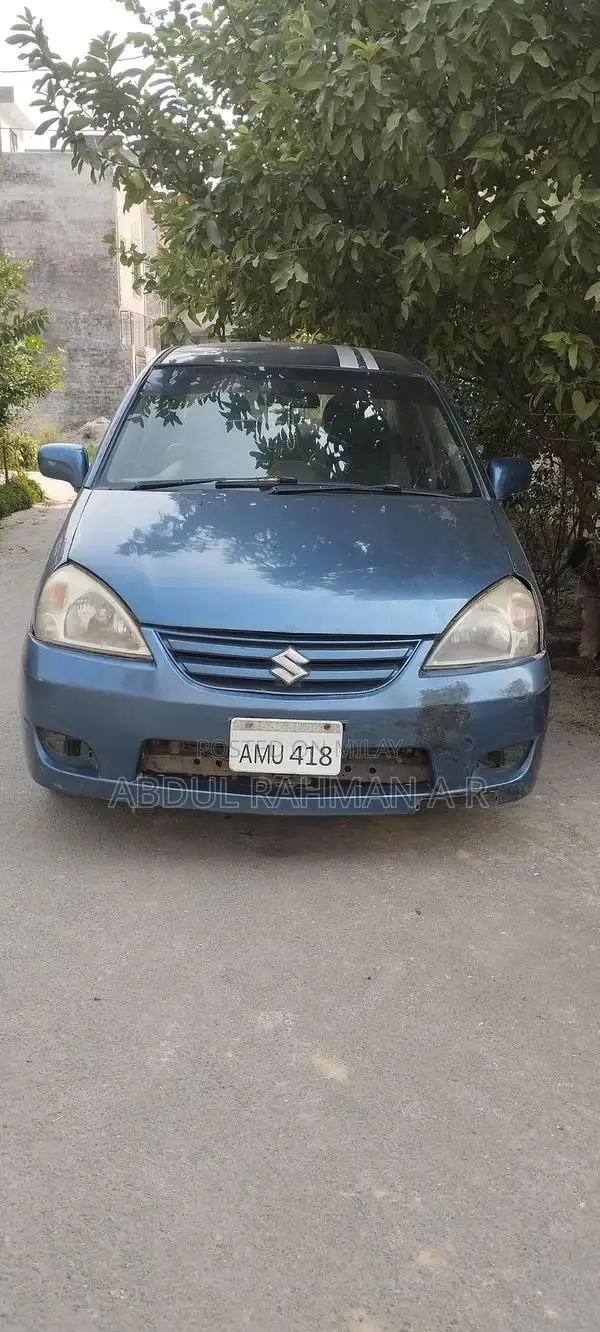 Suzuki Liana Silver Sedan with Air Conditioning and Music System