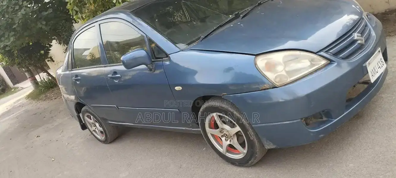 Suzuki Liana Silver Sedan with Air Conditioning and Music System