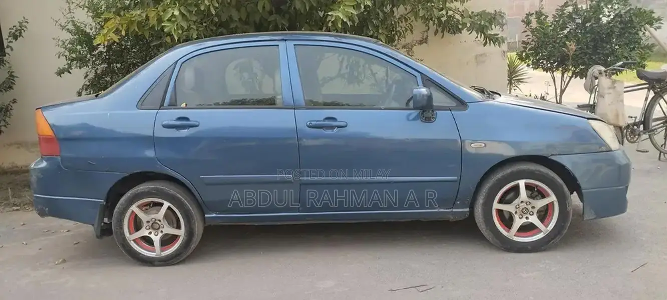 Suzuki Liana Silver Sedan with Air Conditioning and Music System
