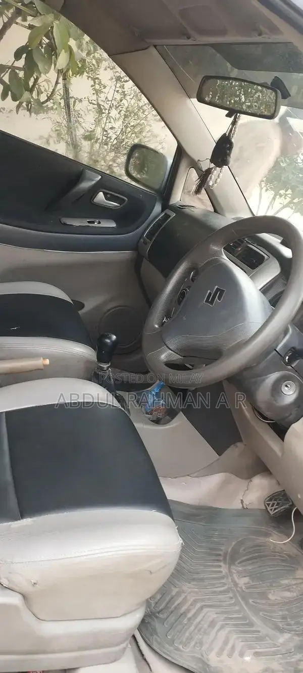 Suzuki Liana Silver Sedan with Air Conditioning and Music System