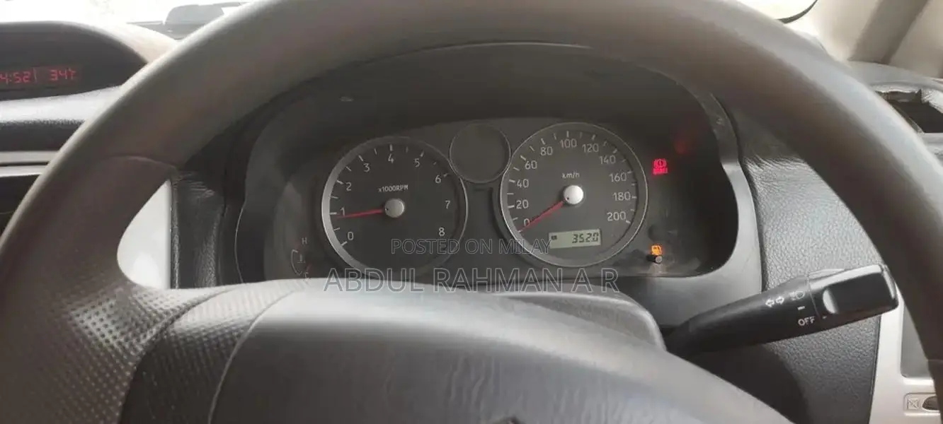 Suzuki Liana Silver Sedan with Air Conditioning and Music System