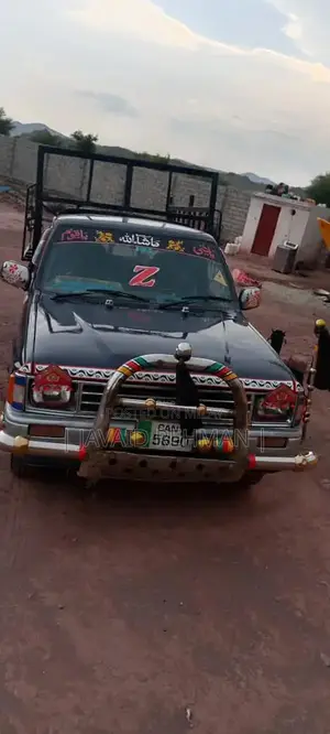 Photo - Classic 1984 Toyota Hilux Pickup Truck