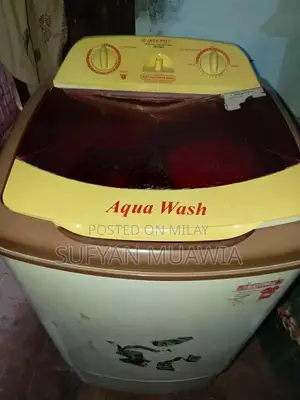 Photo - Compact Front-Load Washing Machine, Reliable Home Appliance