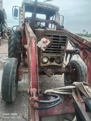 Photo - Used Russi Tractor with Bucket - Good Working Condition