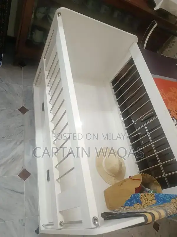 Baby Crib with Storage - Compact and Versatile Infant Bed