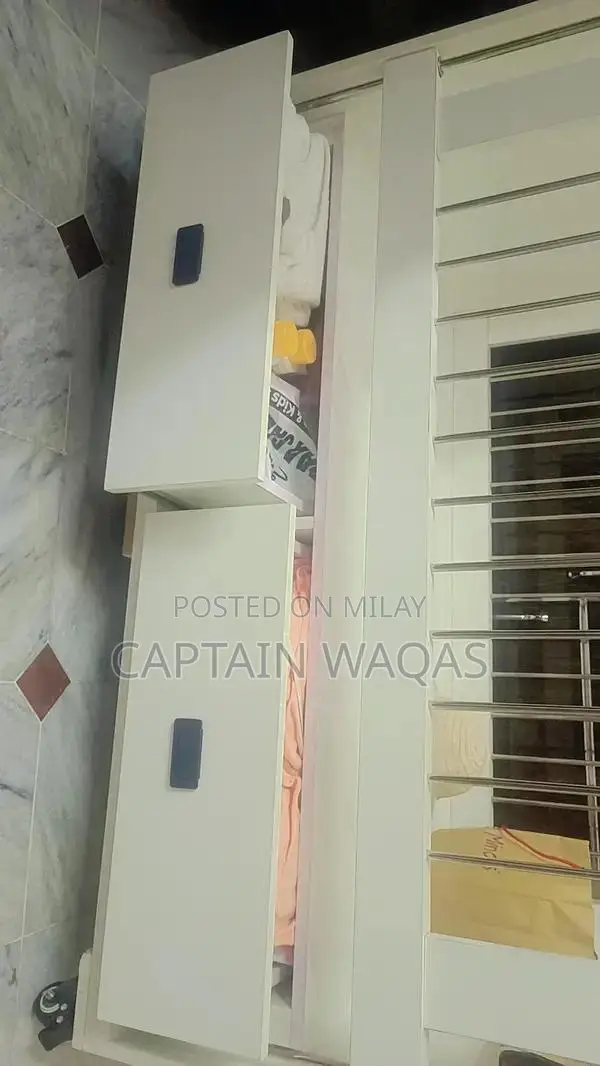 Baby Crib with Storage - Compact and Versatile Infant Bed