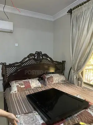 Photo - Full Wooden Bedroom Set with Mattress, Side Tables, and Dresser