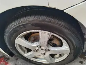 Toyota Belta Genuine Sedan - Reliable Compact Car