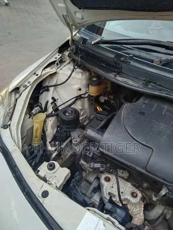 Toyota Belta Genuine Sedan - Reliable Compact Car