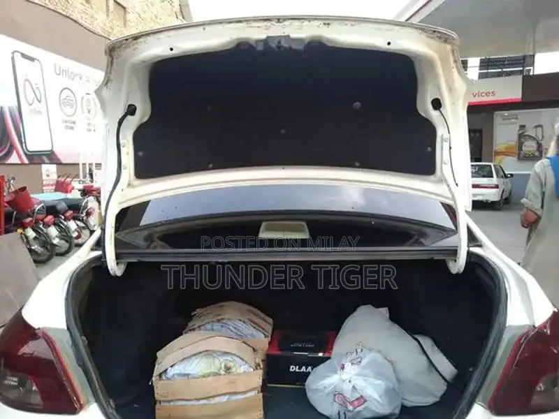 Toyota Belta Genuine Sedan - Reliable Compact Car