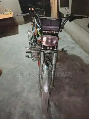 Photo - Honda CG125 Motorcycle - Classic Two-Wheeler