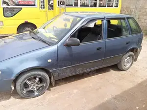 Suzuki Cultus Compact Sedan - Reliable Urban Transportation