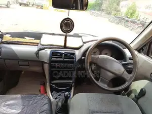 Suzuki Cultus Compact Sedan - Reliable Urban Transportation