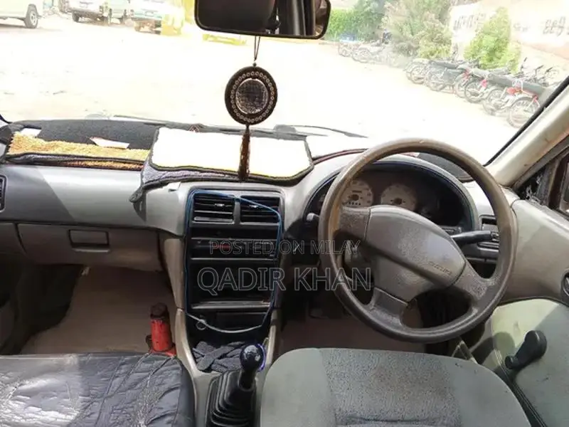Suzuki Cultus Compact Sedan - Reliable Urban Transportation
