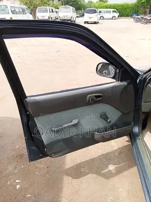 Suzuki Cultus Compact Sedan - Reliable Urban Transportation