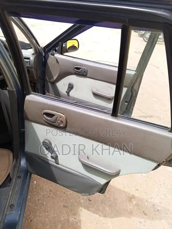 Suzuki Cultus Compact Sedan - Reliable Urban Transportation