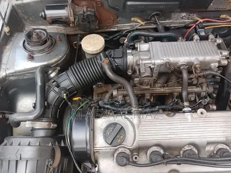 Suzuki Cultus EFI Hatchback Sedan