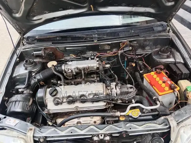 Suzuki Cultus EFI Hatchback Sedan