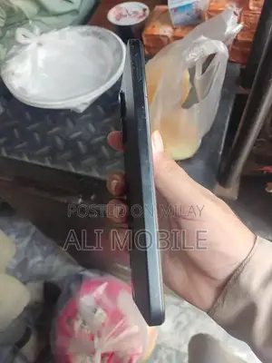 Redmi 13C Smartphone - Sleek Black Compact Design