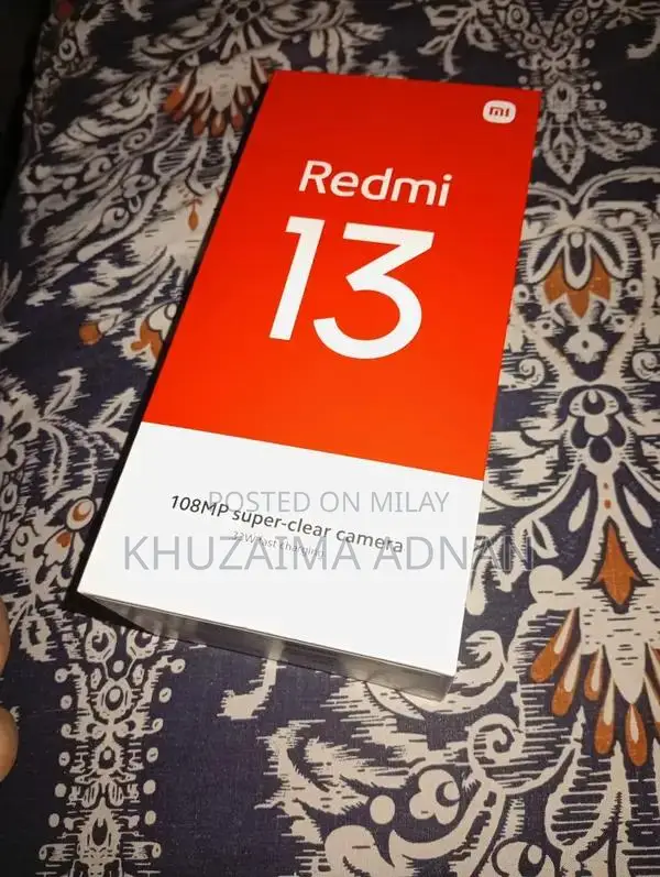 Redmi Smartphone with Original Charger in Brand New Condition