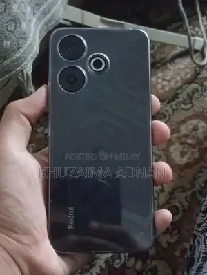 Redmi Smartphone with Original Charger in Brand New Condition