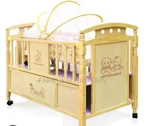 Photo - Infant Crib with Swing - Gently Used Nursery Furniture