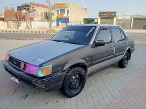 Photo - Toyota Corolla 1986 Sedan with Power Steering and LED Panel