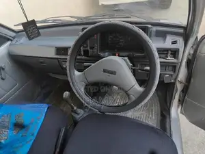 Photo - Mehran Compact Sedan - Well Maintained Reliable Vehicle