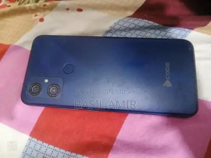 Compact Smartphone with Glass Display and Moderate Storage