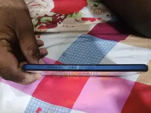 Compact Smartphone with Glass Display and Moderate Storage