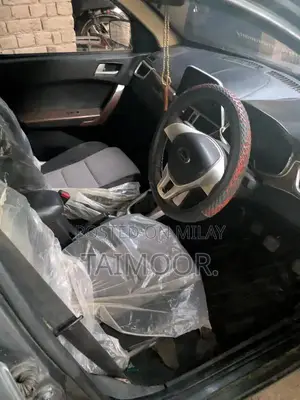 Photo - United Bravo Compact Sedan - Well Maintained Vehicle