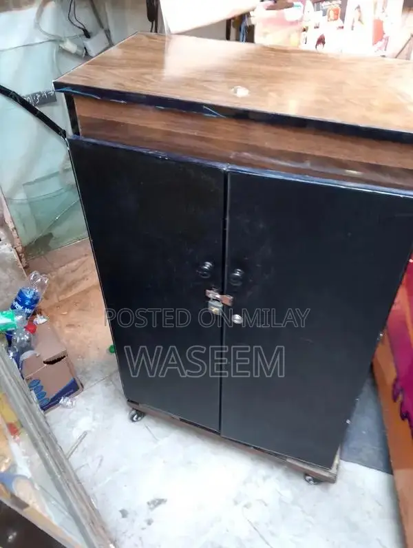 Vintage Iron Cigarette Counter Stand with Wheels