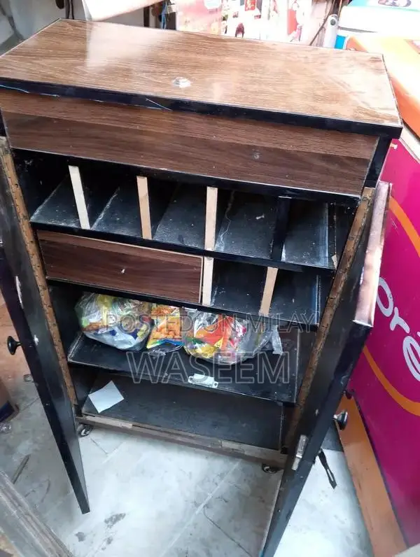 Vintage Iron Cigarette Counter Stand with Wheels