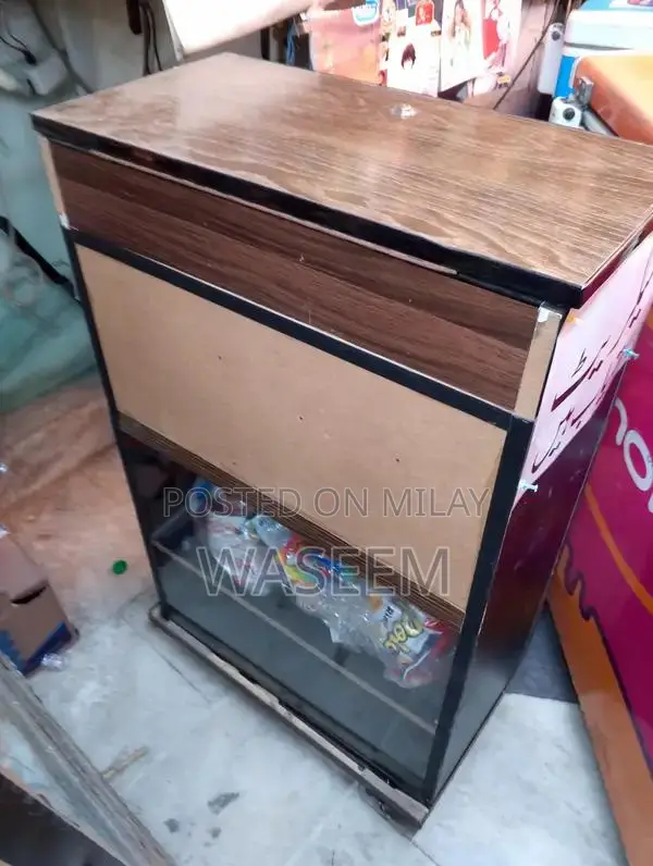 Vintage Iron Cigarette Counter Stand with Wheels