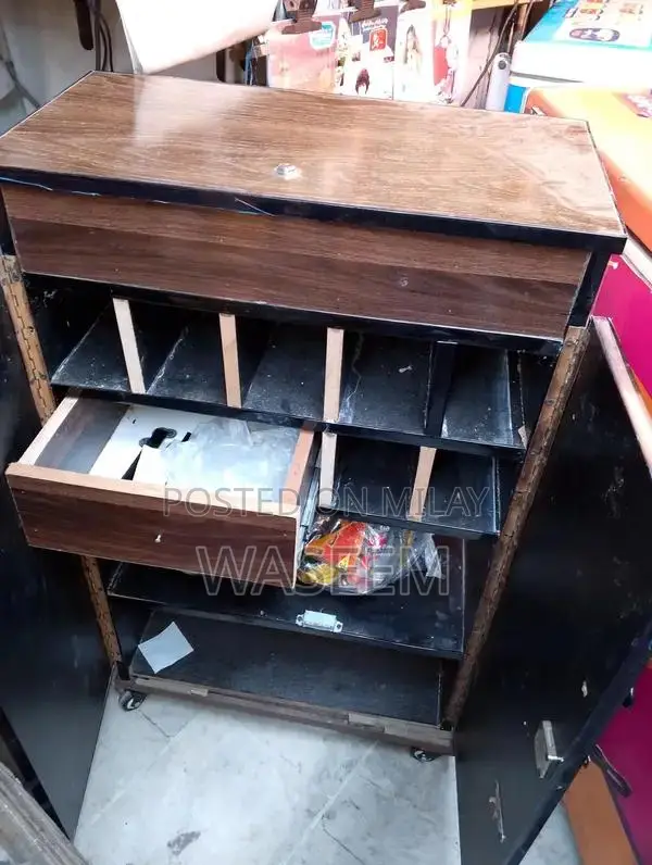 Vintage Iron Cigarette Counter Stand with Wheels