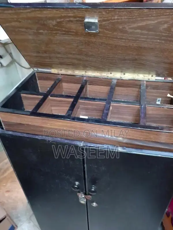 Vintage Iron Cigarette Counter Stand with Wheels