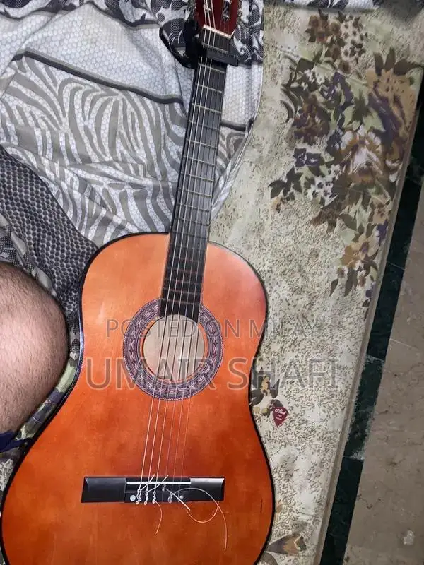 Professional Classical Guitar with Spare Strings and Capo