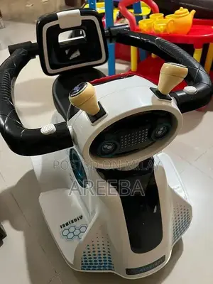 Photo - Kids Electric Ride-On Car with Lights and Smooth Riding Experience