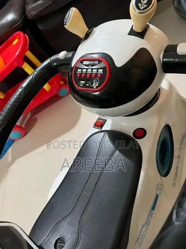Kids Electric Ride-On Car with Lights and Smooth Riding Experience