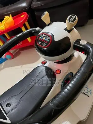 Kids Electric Ride-On Car with Lights and Smooth Riding Experience