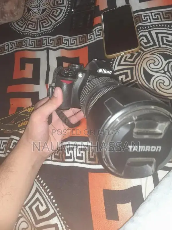 Nikon D3100 DSLR Camera with 70-300mm Lens