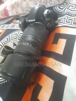 Nikon D3100 DSLR Camera with 70-300mm Lens